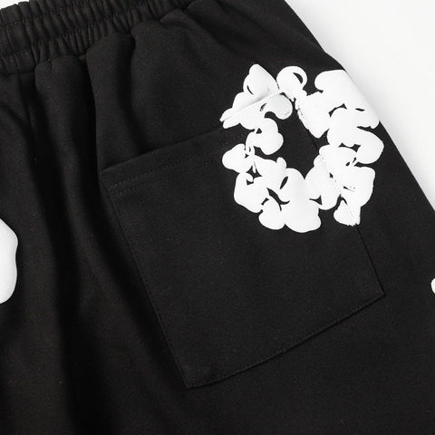 Denim Tears Black Cotton Sweat Shorts With White Textured Flower Wreath Print